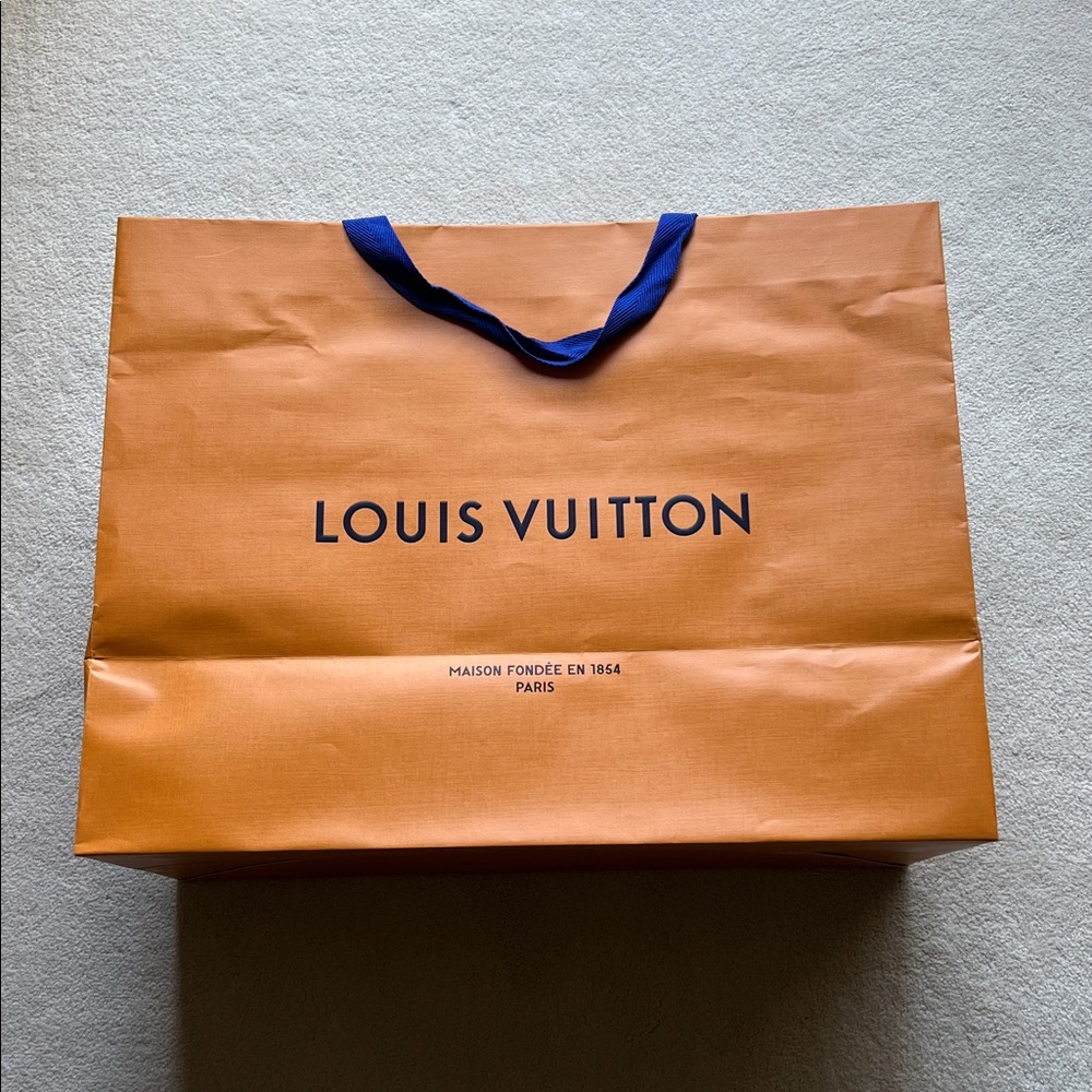 Louis Vuitton XL paper bag 23.25”x17.75”x10.25”with slight creases&clean inside